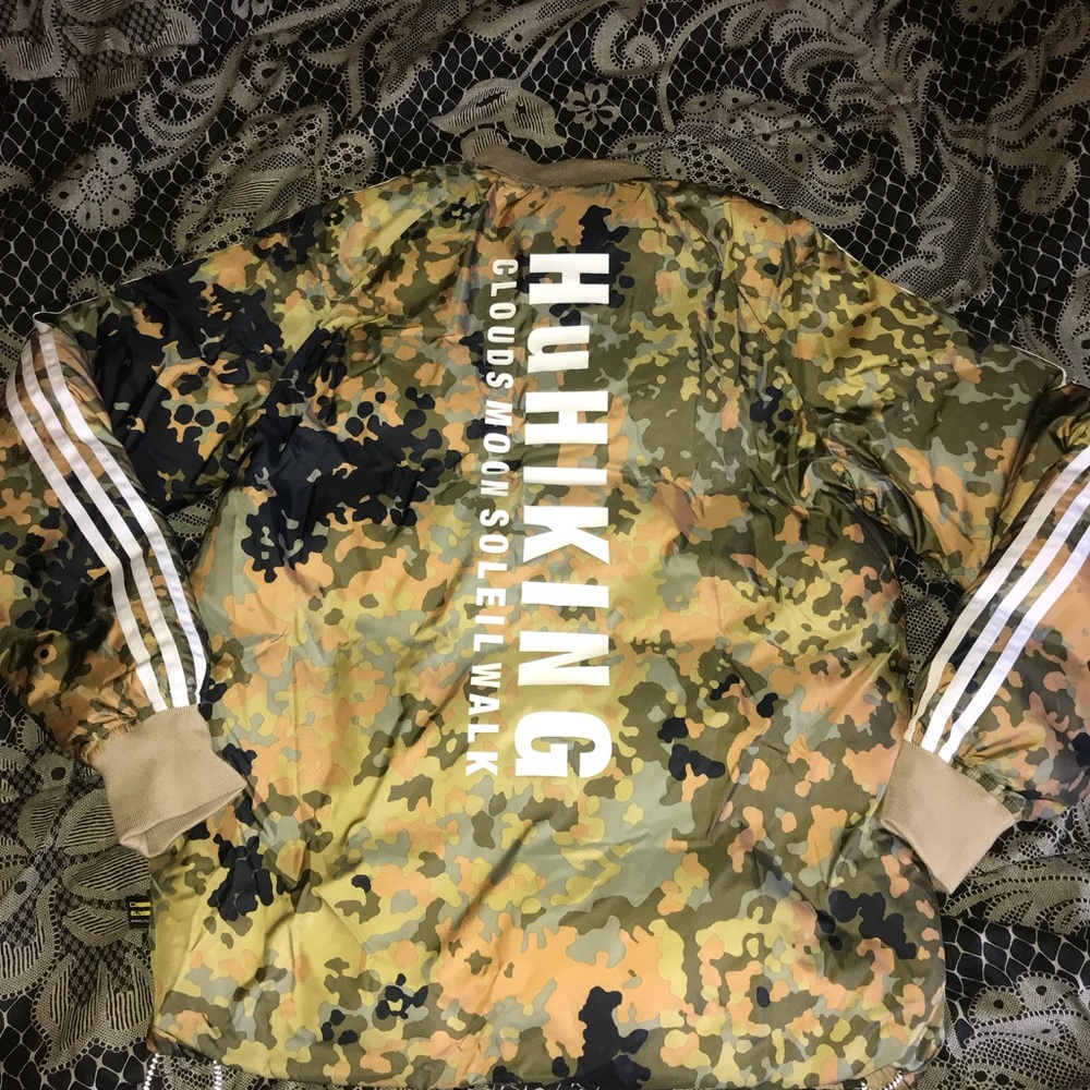 Adidas human race coat